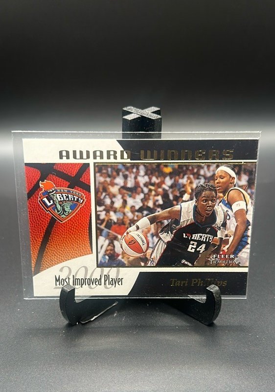 2001 Fleer Tradition WNBA #10 AW Tari Phillips Award Winners