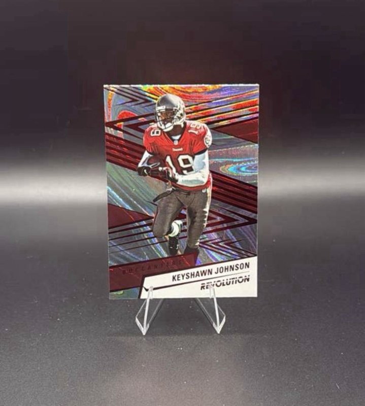 2025 Panini Revolution - Keyshawn Johnson #24 Blue Swirl /99