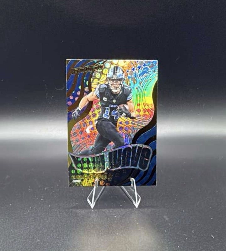 2025 Panini Revolution - New Wave Amon-Ra St. Brown #20