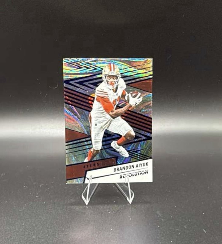 2025 Panini Revolution - Brandon Aiyuk #119 Blue Swirl /99