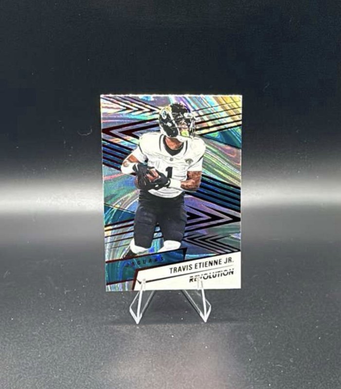 2025 Panini Revolution - Travis Etienne #92