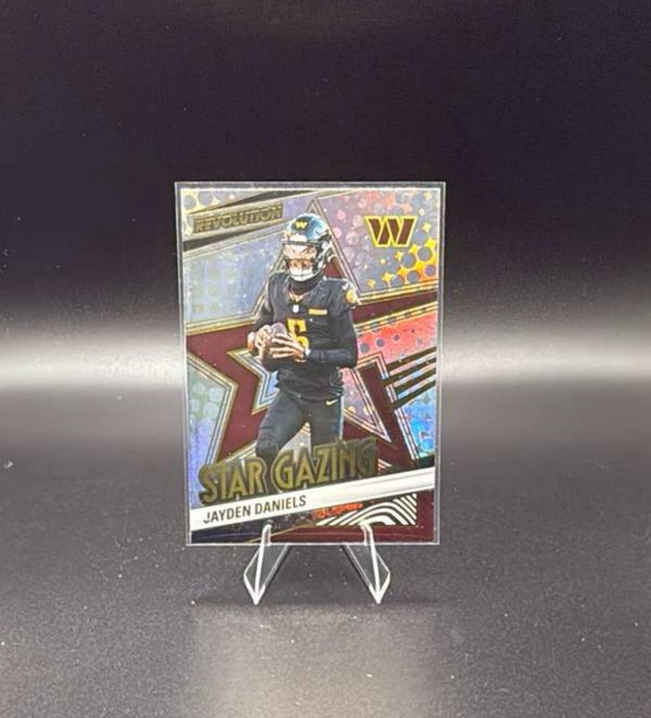 2025 Panini Revolution - Star Gazing Jayden Daniels #23