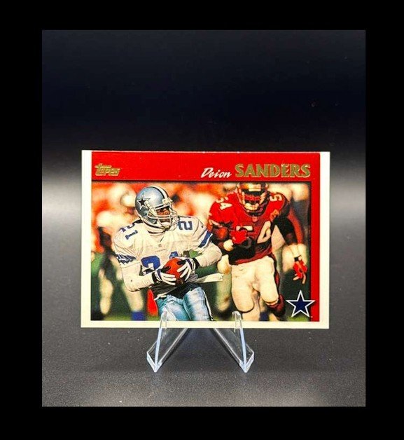 1996 Topps Deion Sanders (#5) football card.